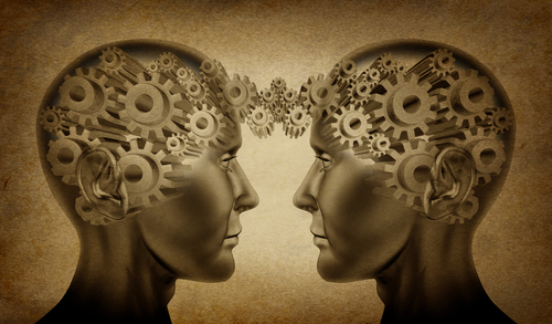 Illustration of two stylized heads, with gears representing thoughts being exchanged between the two.