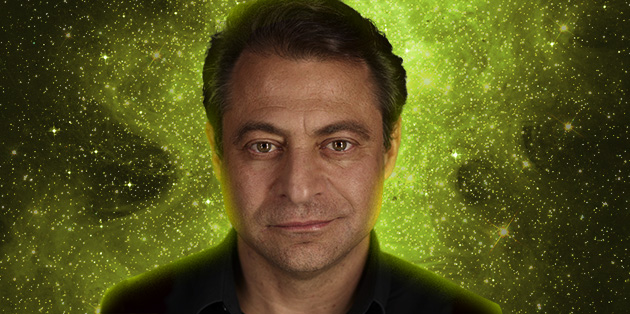 A man's head and shoulders superimposed on an eerie green and black speckled background.