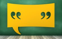A rectangular yellow speech bubble containing a set of quotation marks, on a green background.
